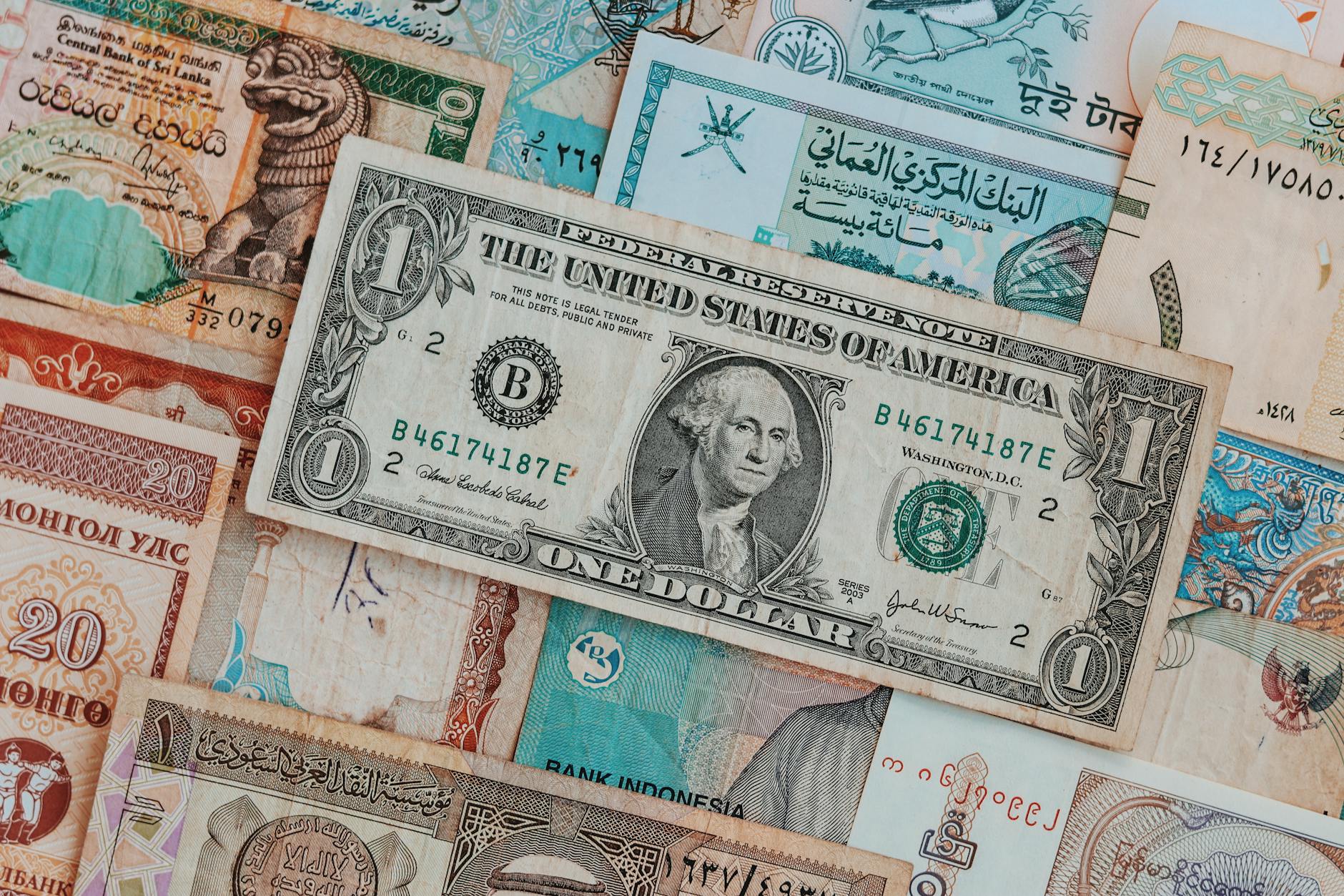 A world map with different currencies symbolizing foreign exchange