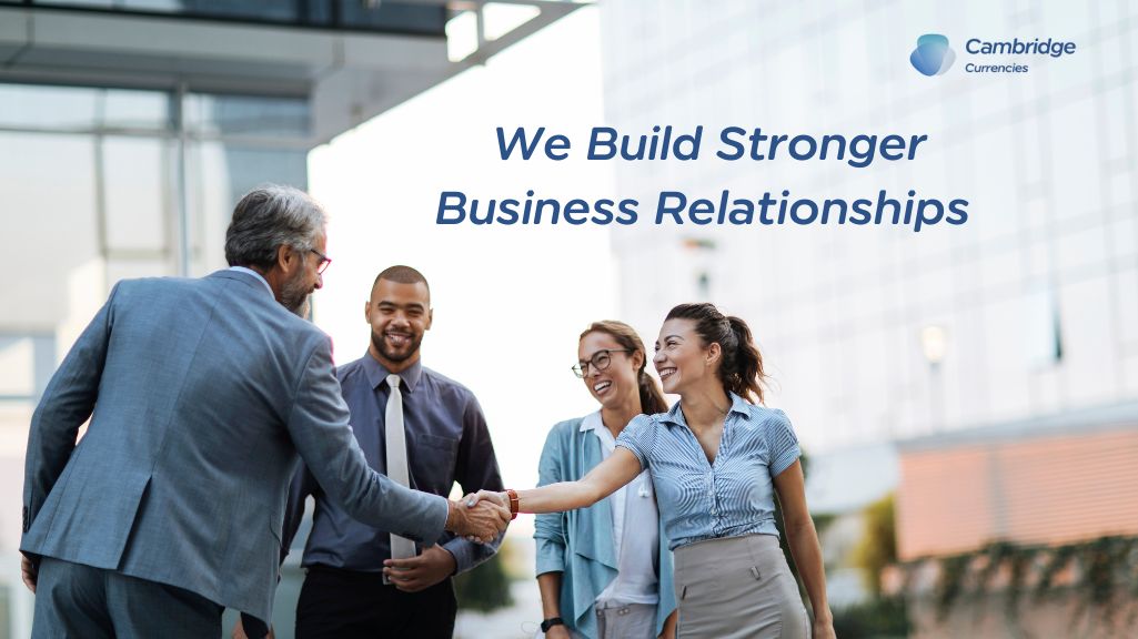 Cambridge Currencies Team Shaking hands and building relationships with clients