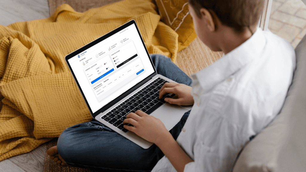 Person sitting using their online banking platform to make an ACH payment.