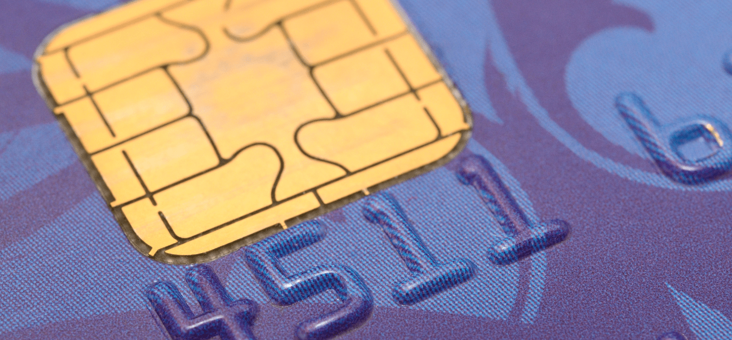 Credit card close-up with account number visible, used to illustrate the difference between IBAN and standard bank account numbers for international money transfers.